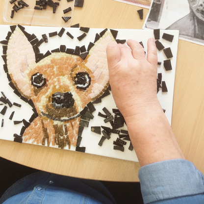 Student making mosaic